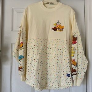 DISNEY EATS SNACKS SPIRIT JERSEY PULLOVER CREAM - XS
